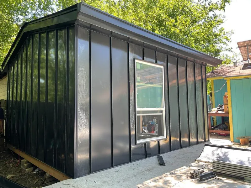 Black standing seam metal wall panels for Roof Inspection in Clarkston