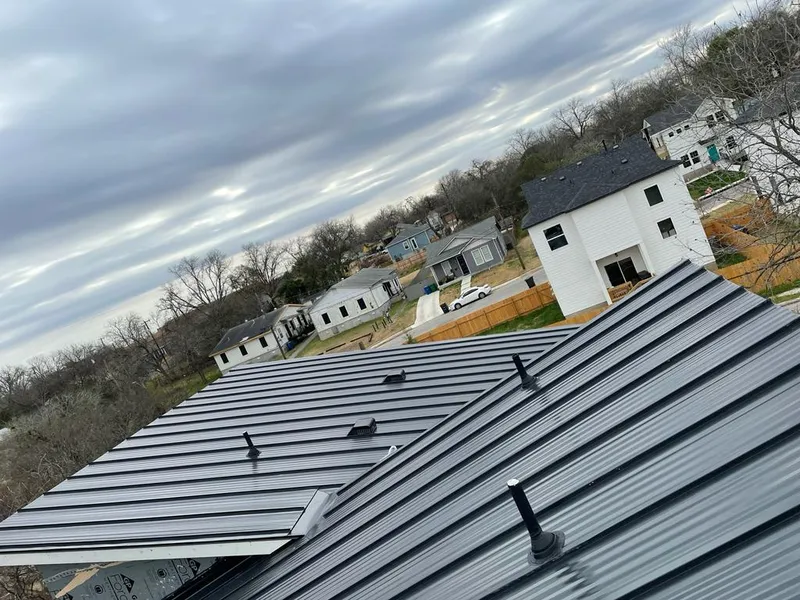 Standing seam metal roof panels with vents for Skylight Repair in Clarkston